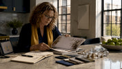 Designer reviewing crystal chandelier catalog