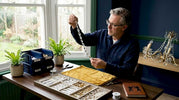 Lighting specialist comparing crystal chandelier accessories