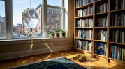Crystal prism scattering rainbows in sunlight