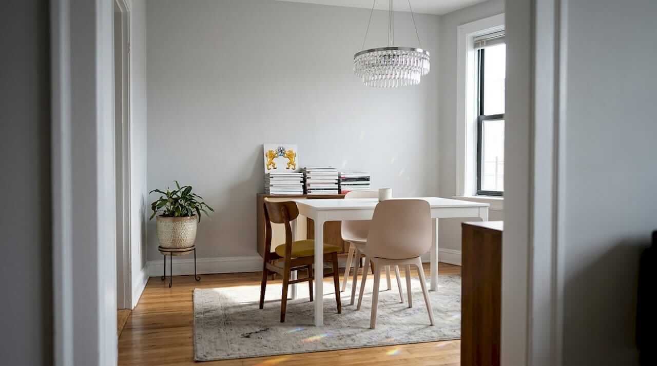 Crystal chandelier in understated modern apartment