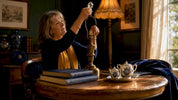 Woman attaching crystal finial to lamp