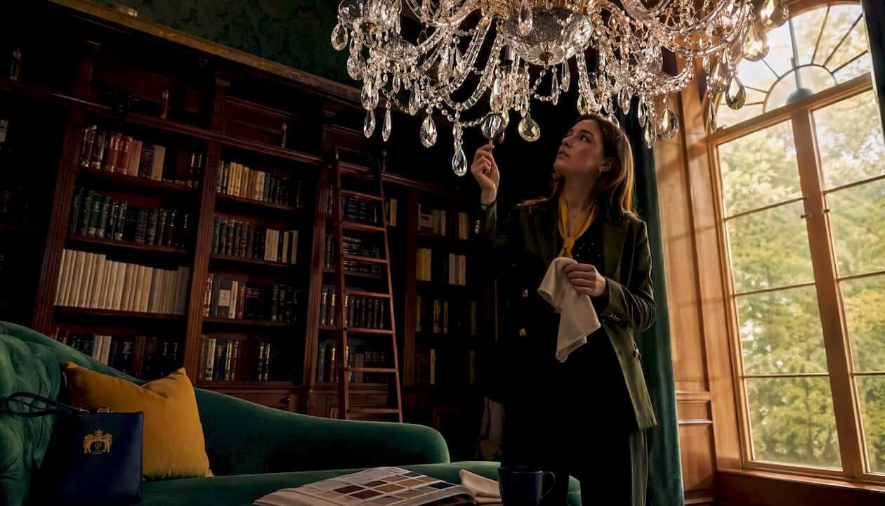 Designer examining real crystal chandelier prisms