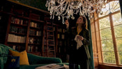 Designer examining real crystal chandelier prisms
