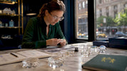 Design professional studying crystal terminology at table