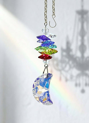 Colorful Swarovski  crystal hanging ornament with rainbow effect on a white background