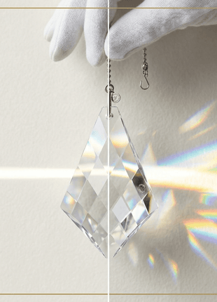 Crystal prisms with rainbow effect on a neutral background