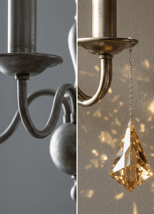 Close-up of a chandelier with a crystal pendant against a neutral background