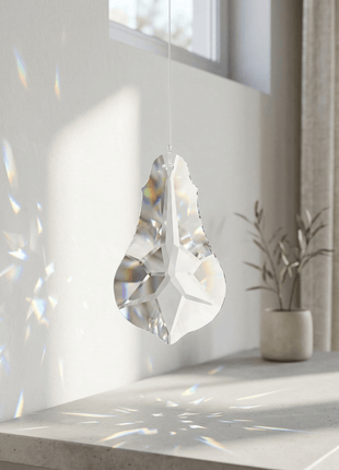 Crystal decoration on a shelf with sunlight filtering through a window