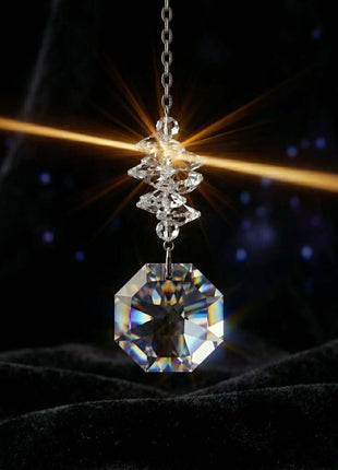Swarovski Crystal car hanging charm with a dark background