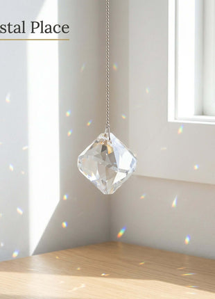 Swarovski Crystal hanging ornament in a room with sunlight 