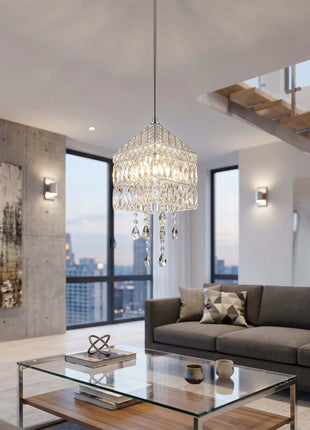 Modern living room with a chandelier, sofa, and glass coffee table by crystalplace.com