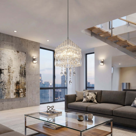 Modern living room with a chandelier, sofa, and glass coffee table by crystalplace.com