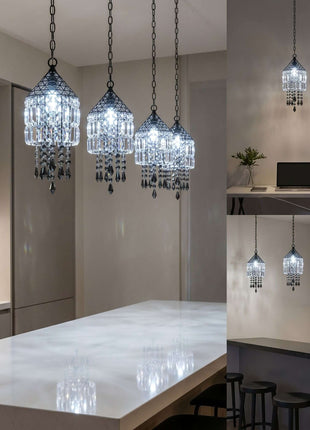 Set of three crystal pendant lights in a modern kitchen setting by crystalplace.com